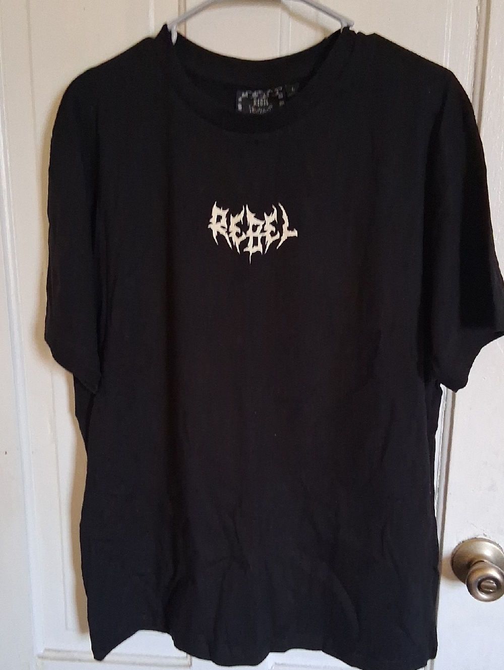 rebels Black Tee with White 'REBEL' Distressed Graphic